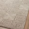 Darby Rug angled view on wood floor emphasizing subtle color variations and pile detail.