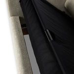 Closer top view of sleeper frame showing black fabric covering and metal tube supports