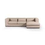 Front-facing view of the sectional highlighting the full-length seating with three back cushions and right chaise