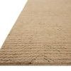 Side angle showing thickness and textured ribbed surface of Kai Beige Rug