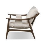 Side view showing slight arch of stretchers and sloped backrest of Kimmery Chair