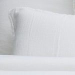 Waverly Duvet Set in white with wavy pebbled texture, ½” flange, shell button closure, and envelope shams