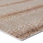 Close-up corner view showing rug’s thin edge binding and detailed spotted texture with metallic highlights