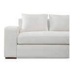 Close-up of Thomas sectional left armrest, seat cushion, and two large back cushions