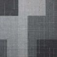 Geometric modern rug with slate and natural gray blocks and thin looped yarn lines for texture