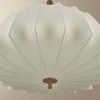 Flinders pendant viewed from below showing the faceted cream fabric shade and central brass suspension