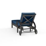 Rear view of Monterey Chaise Lounge highlighting cross back detail and wheels on espresso frame
