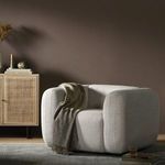 Rear view with smooth rounded back panel showcasing upholstery and silhouette