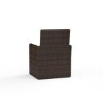 Rear view showing full Cognac resin wicker weave and chair’s solid back without cushion