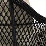 Close-up of woven black armrest with diamond pattern and cream cushion corner on Soho Woven Sofa