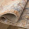 Rug folded over to reveal soft pile height and tightly stitched binding along edges