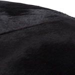 Close-up showing fine black hair-on hide texture and subtle highlights
