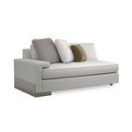 Sectional sofa angled to show metal base detail under wide shelf-arm and cushion arrangement