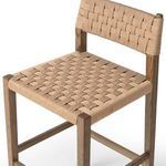 Detailed angled close-up of Hamlin Stool's woven seat and oak legs with visible weaving texture