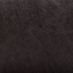 Macro detail of smooth, matte black leather back cushion with natural texture and grain