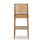 Rear view showing the full woven backrest and vertical support within wood frame