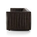 Side profile from left showing uniform channeling detail on armrest and backrest