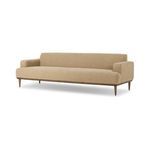 Ethel Sofa shown angled right, highlighting low track arm and tapered wood legs