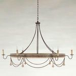 Jean Chandelier shown against light gray wall background, centered front view