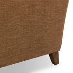 Close-up showing tapered rear leg and upholstery on Lynne chair