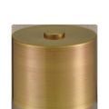 Close-up of the smooth metal drum shade in polished brass