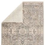 Repeat of close-up of rug corner showing intricate border pattern detail and cream fringe