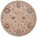 Round variation of Giada Blush Rug featuring same classic design and color palette