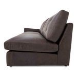 Side profile of Thurlow sofa highlighting thick cushions and leather texture on sloped arm