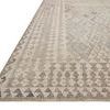 Close-up angled view showing detailed power-loomed texture and soft pile of the rug's border patterns