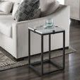 Archer Chairside Table styled with glass and cloth, positioned next to light sofa on wood floor
