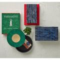 Top-down close view showing rectangular blue bamboo pattern with bone inlay on flat box lid