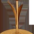 Close-up of gold arcing leaves extending from the sconce base under a globe light