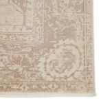Close-up of vintage border patch with intricate floral and mosaic elements