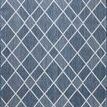 Reversible side of Easton Ivory Denim Rug in denim blue with white diamond pattern and border