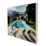 Side angled view of mounted Palm Springs pool print illustrating glossy surface and white frame edge