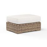 Havana Ottoman with aged tobacco all-weather wicker base and thick off-white cushion top