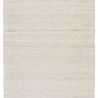 Handwoven indoor/outdoor tribal area rug in cream and light gray with geometric pattern
