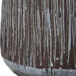 Close-up detail of ceramic lamp base showing vertical deep grooves with blue-gray crackle glaze and rust brown color beneath