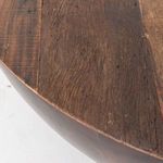 Close-up textured surface of rustic wood planks on table top highlighting grain and natural marks