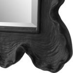 Close-up of textured black sea coral design on bottom corner of Sea Coral Black Mirror frame