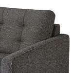 Close-up of upper armrest and tufted back cushion fabric texture