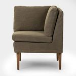 Corner dining banquette with Broadway Olive flax/linen upholstery and solid amber oak tapered legs