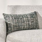 Porter Throw Pillow styled on light gray fabric sofa in living room context
