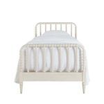 Jennifer Twin Bed front view showing spindle footboard design with white bedding