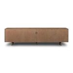 Back of media console showing smooth wood panel with cable management hole