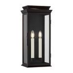 Louie Exterior Wall Sconce in Forged Iron finish with three glass panels and two off-white candlestick lights