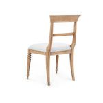 Lawrence Side Chair rear angle showing open wooden back and curved back legs