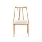 Front view highlighting straight tapered legs with golden metal caps on Fiona Chair