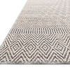 Edge view highlighting rug’s thickness and detailed geometric design