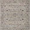 Traditional Sorrento Mist Charcoal area rug with intricate faded vintage pattern in muted gray and beige tones